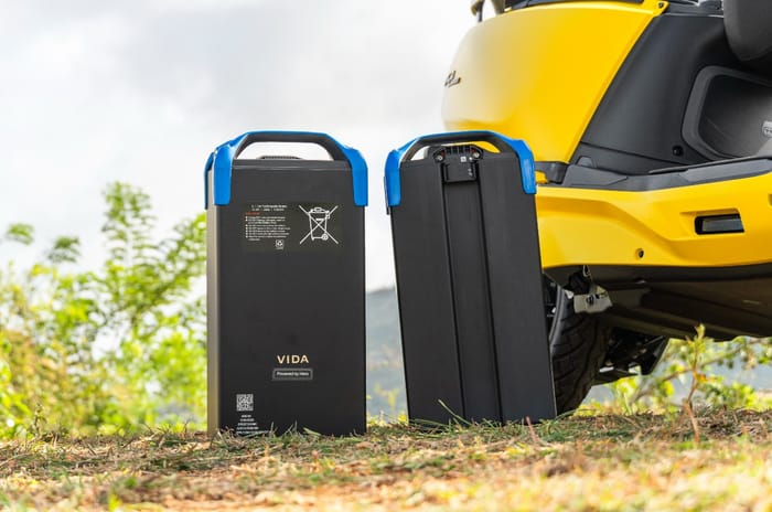 Vida VX2 batteries beside scooter